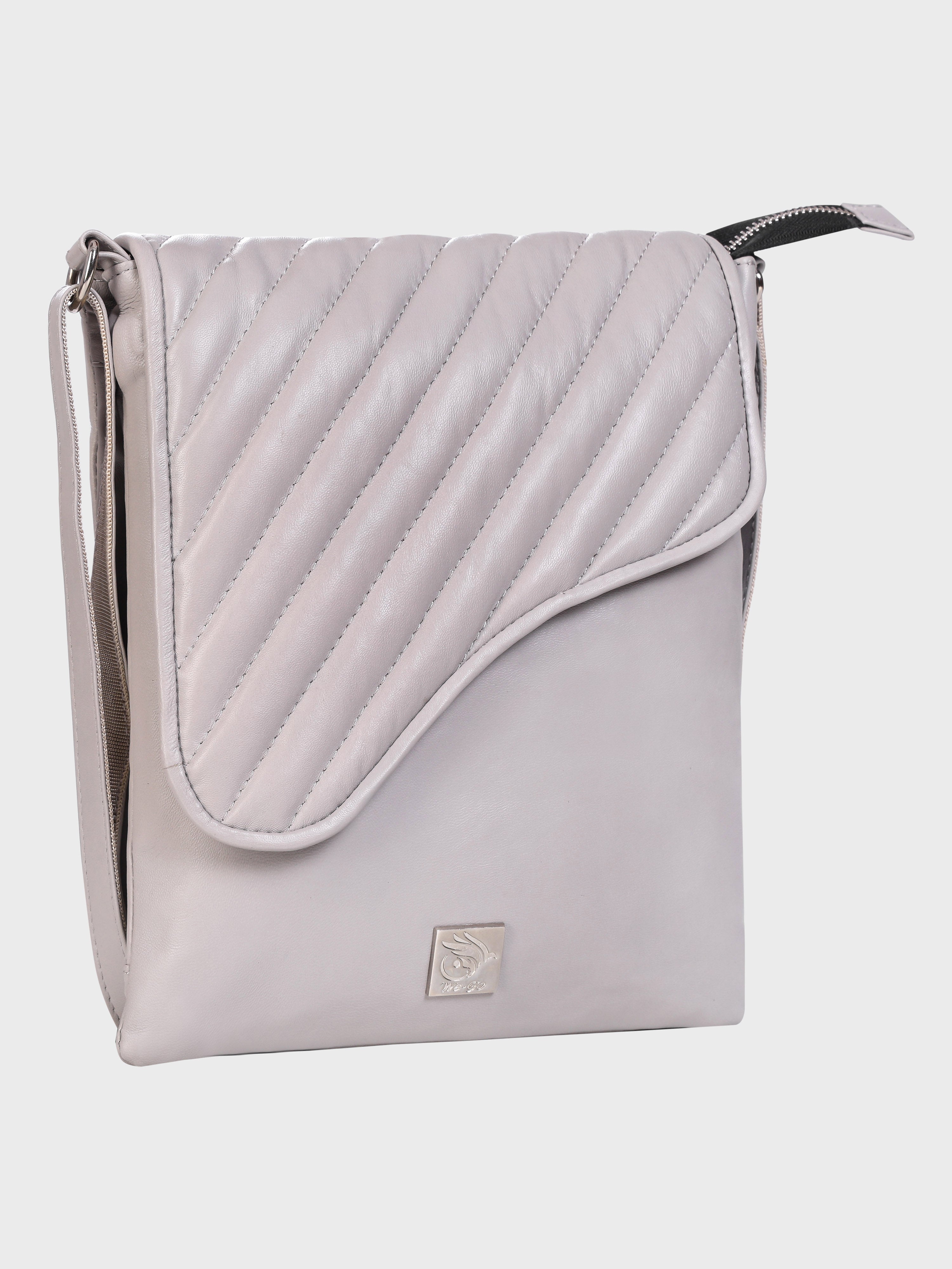 Genuine Leather , soft ,supple multiple compartments womens travel bag